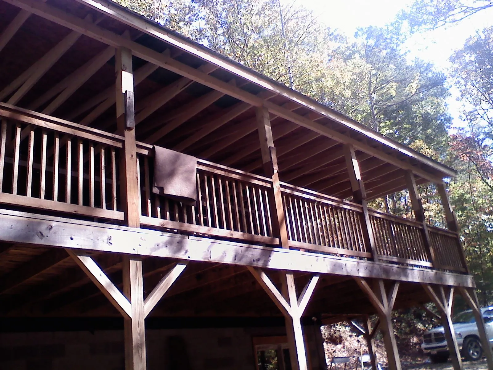 Timber framing under a new elevated porch and deck — Roof Leak Repair in Valley Village by Roofing Brothers